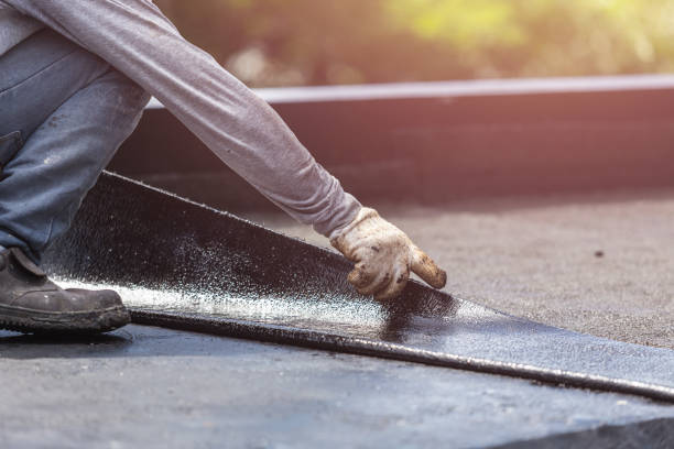 Professional Basement Waterproofing technician working in North Newton, KS